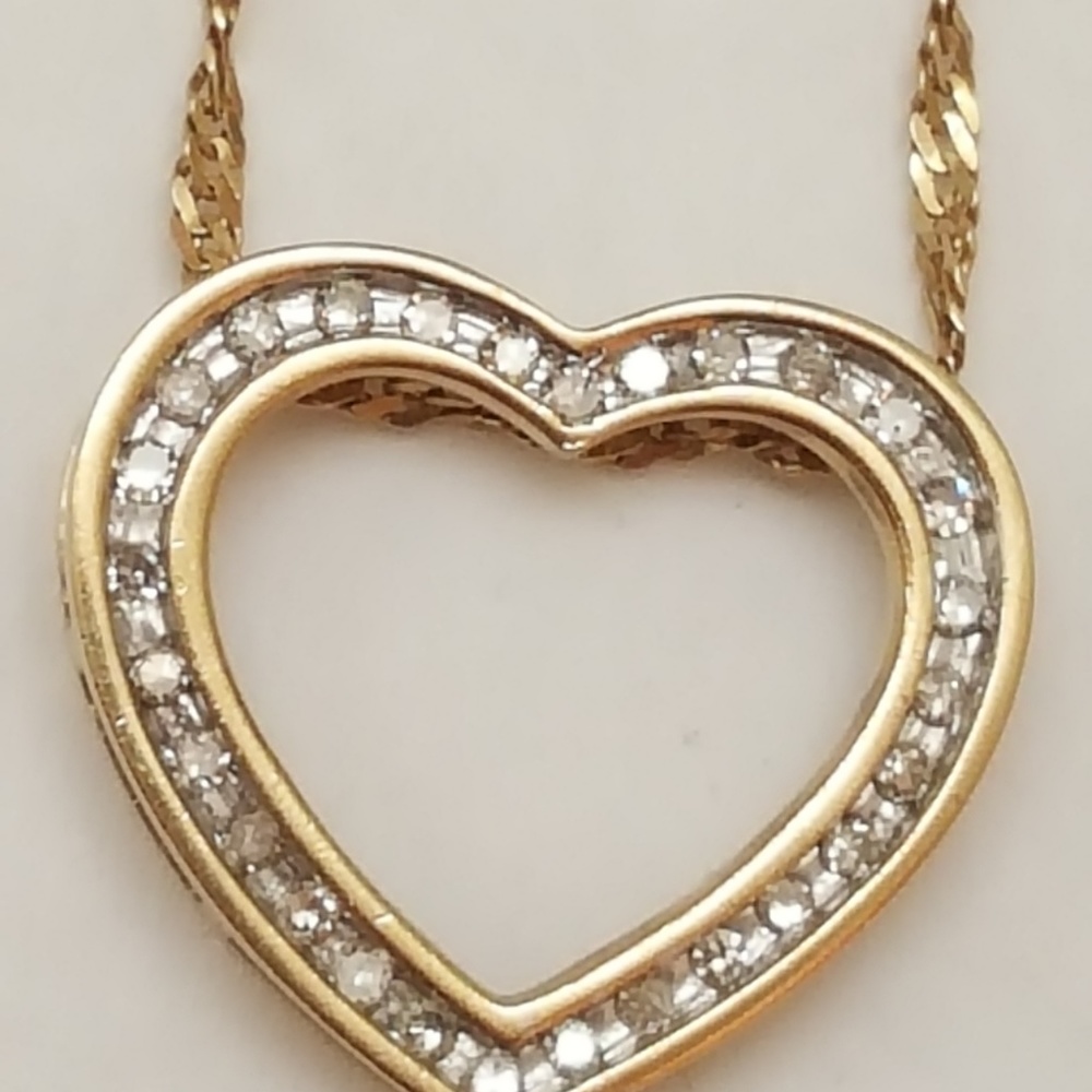 Estate Vintage 10k gold  .50ct diamond pendant